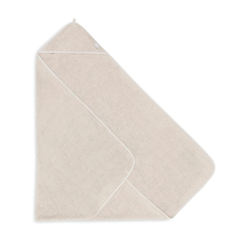 Eine Seite des Baby Kaputzen-Handtuchs in beige / nougat aufgeschlagen