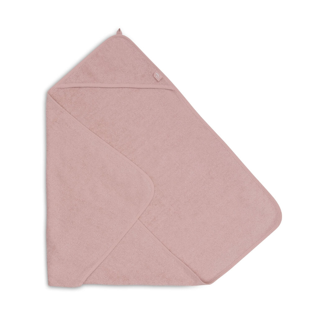 Eine Seite des Baby Kaputzen-Handtuchs in rosa aufgeschlagen