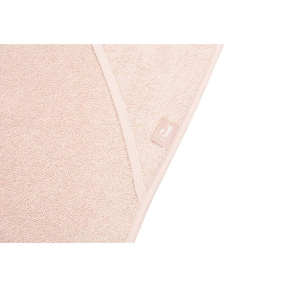 Nahaufnahme des weichen Frottee Stoffs des rosa Baby Kapuzenhandtuchs