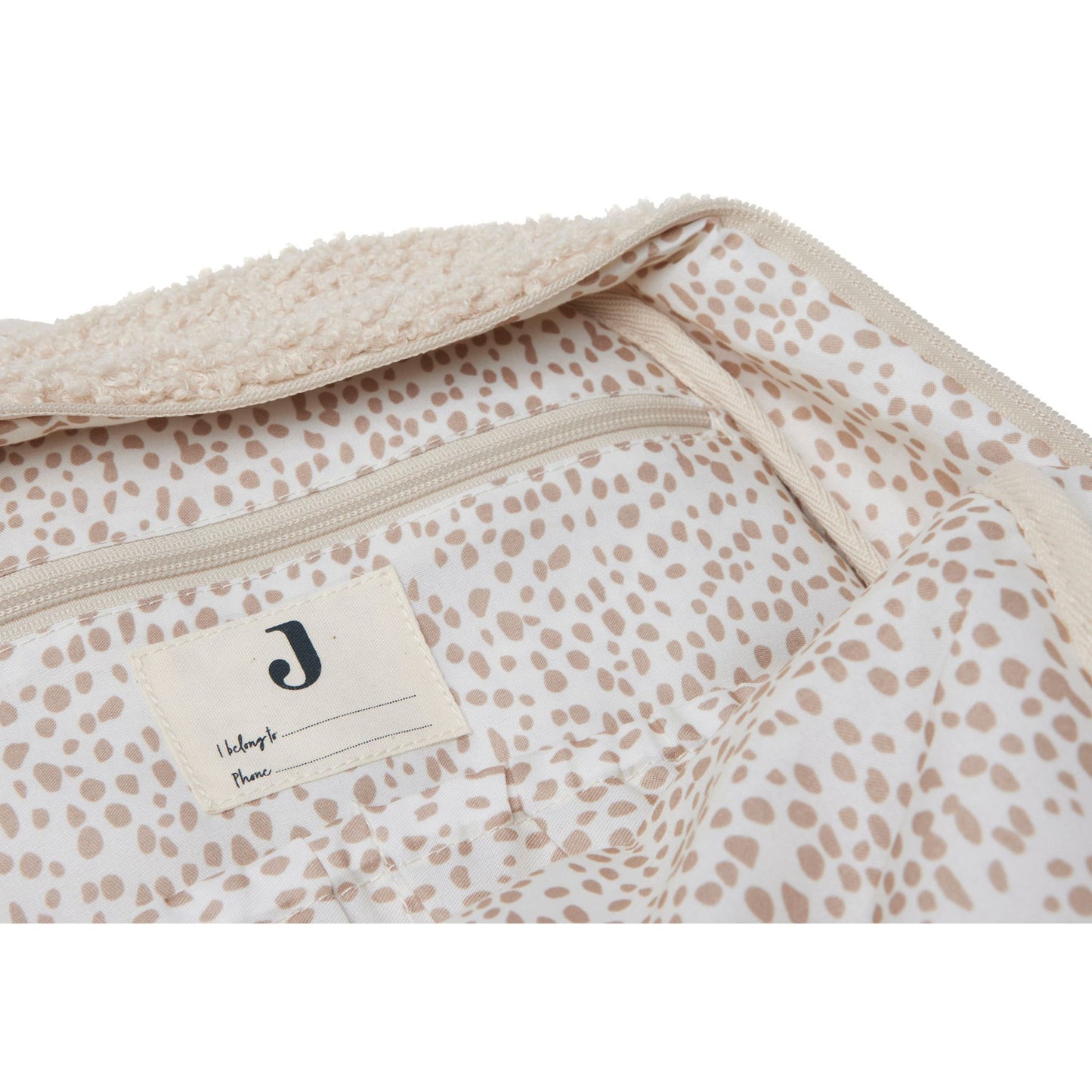 Innenansicht Innenfutter mit Pünktchen Muster von Wickeltasche Rucksack Beige in Teddy Optik 