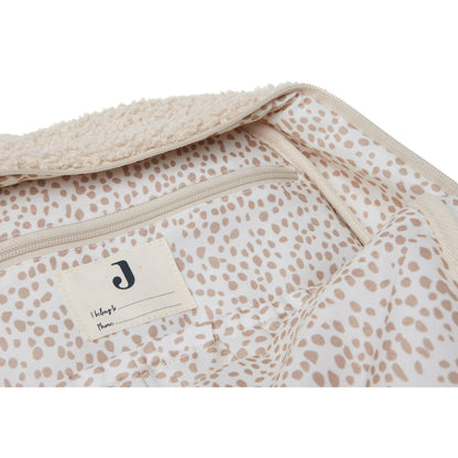 Innenansicht Innenfutter mit Pünktchen Muster von Wickeltasche Rucksack Beige in Teddy Optik 